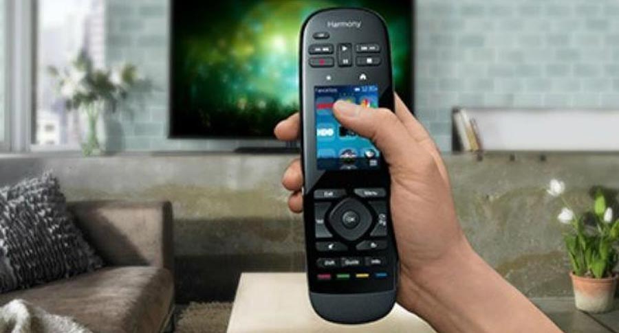 person holding unified remote